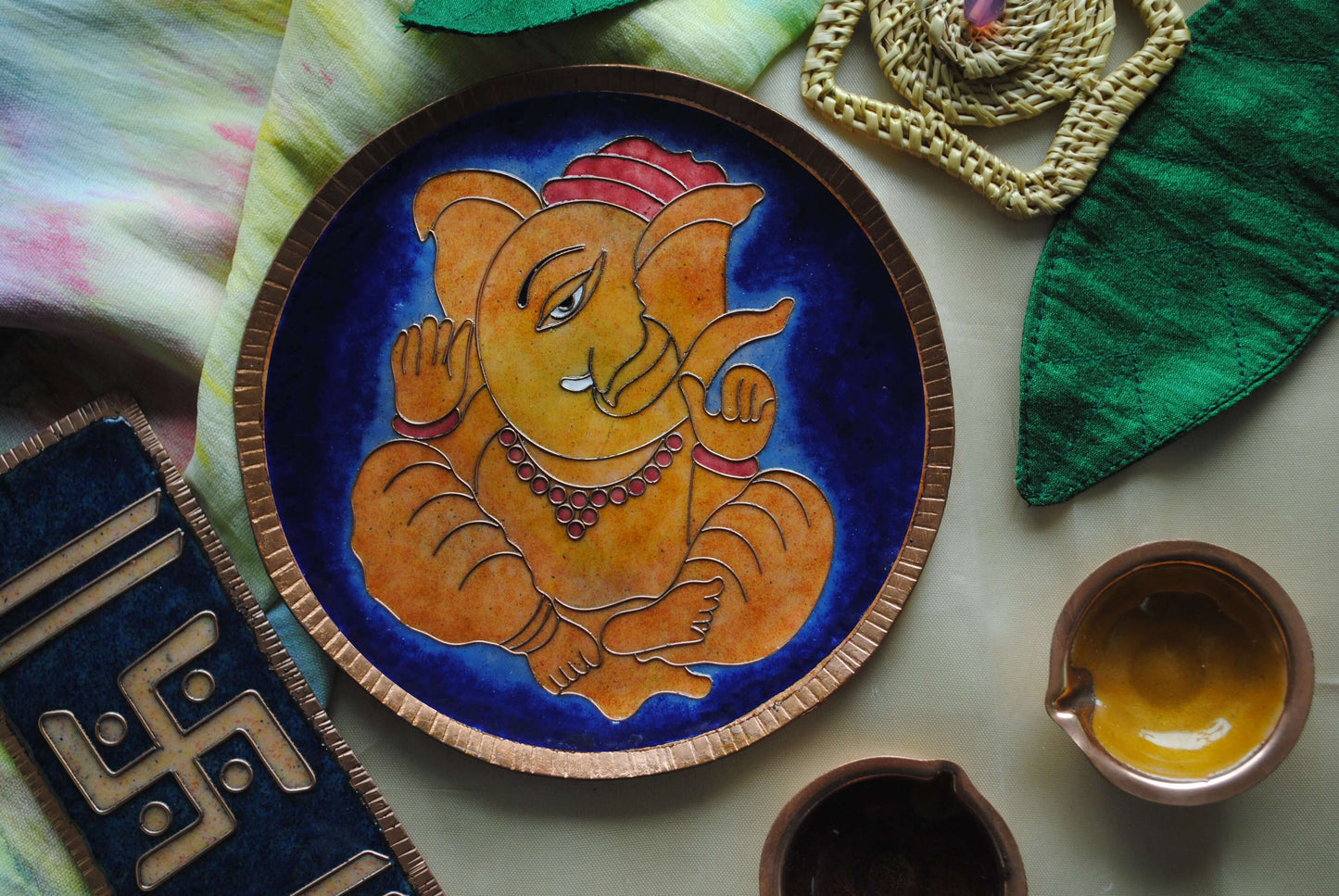 Home decor wall plates of Ganesh as Omkara, Ekdanaka, Vinayaka, handpainted and enameled on beaten copper