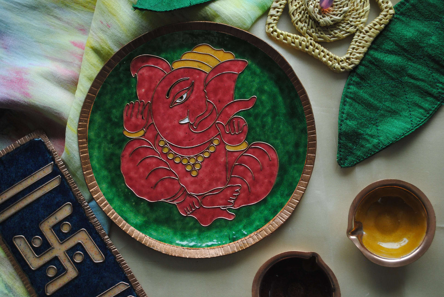 Home decor wall plates of Ganesh as Omkara, Ekdanaka, Vinayaka, handpainted and enameled on beaten copper