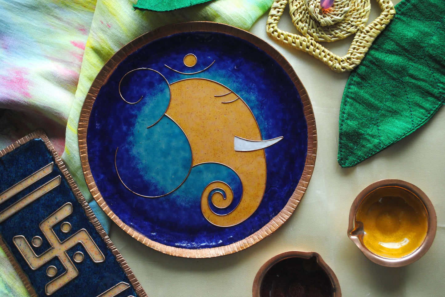 Home decor wall plates of Ganesh as Omkara, Ekdanaka, Vinayaka, handpainted and enameled on beaten copper