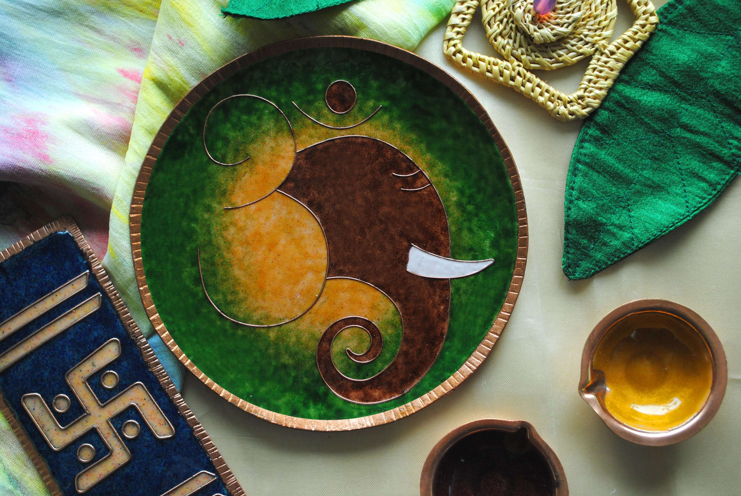 Home decor wall plates of Ganesh as Omkara, Ekdanaka, Vinayaka, handpainted and enameled on beaten copper