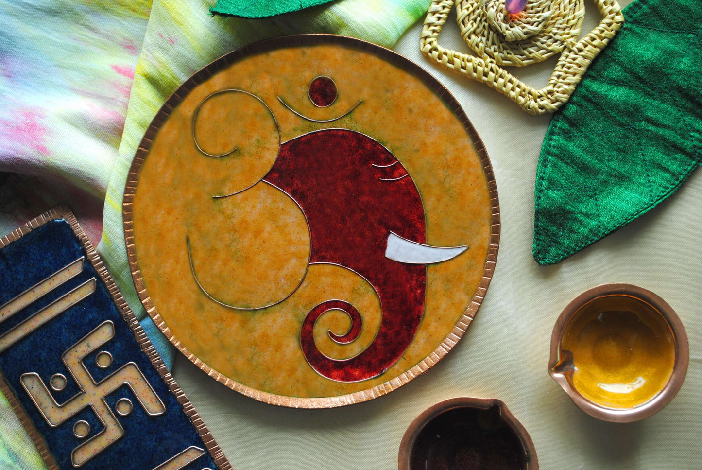 Home decor wall plates of Ganesh as Omkara, Ekdanaka, Vinayaka, handpainted and enameled on beaten copper