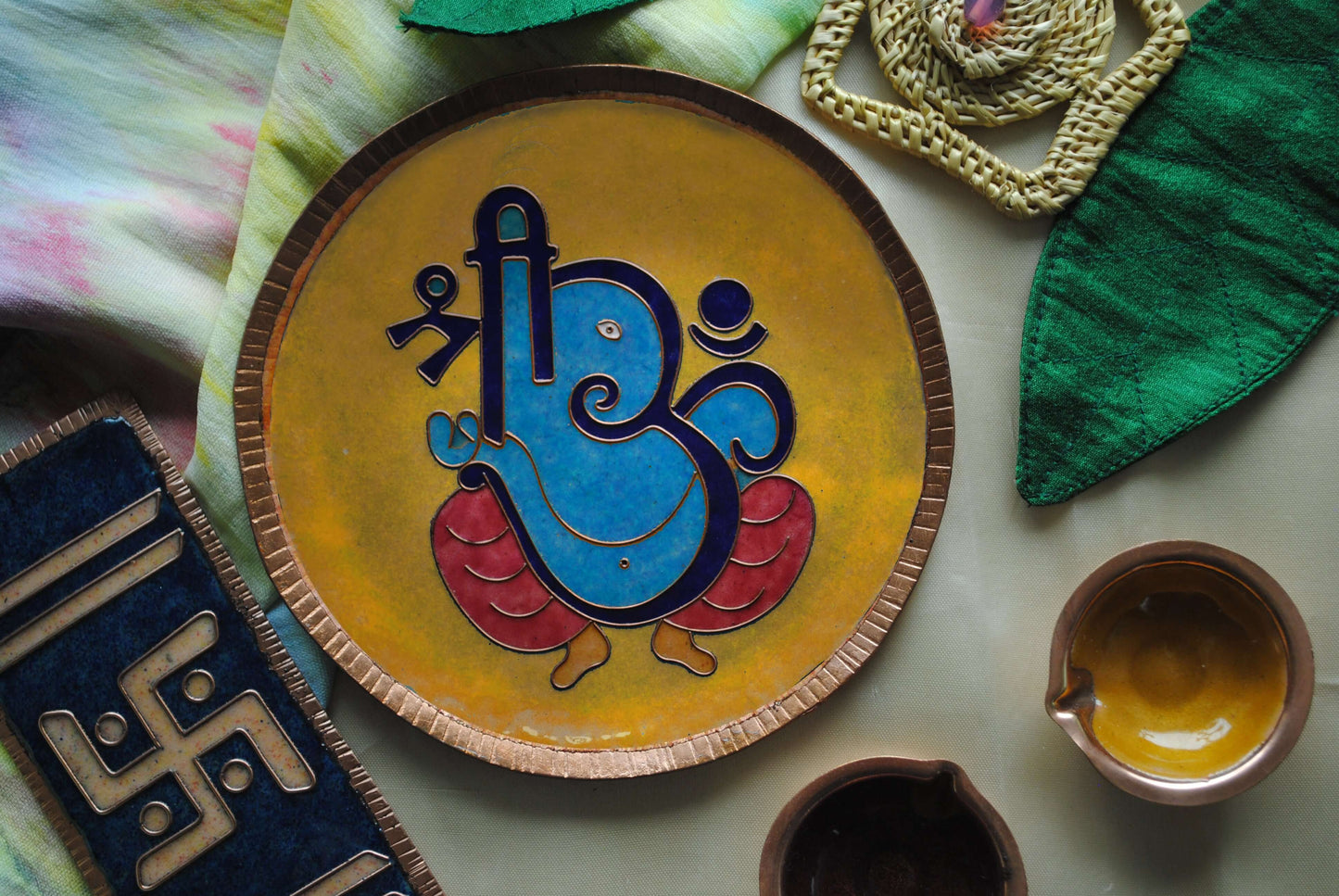 Home decor wall plates of Ganesh as Omkara, Ekdanaka, Vinayaka, handpainted and enameled on beaten copper