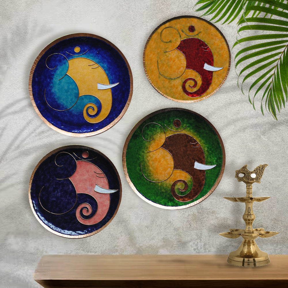 Home decor wall plates of Ganesh as Omkara, Ekdanaka, Vinayaka, handpainted and enameled on beaten copper