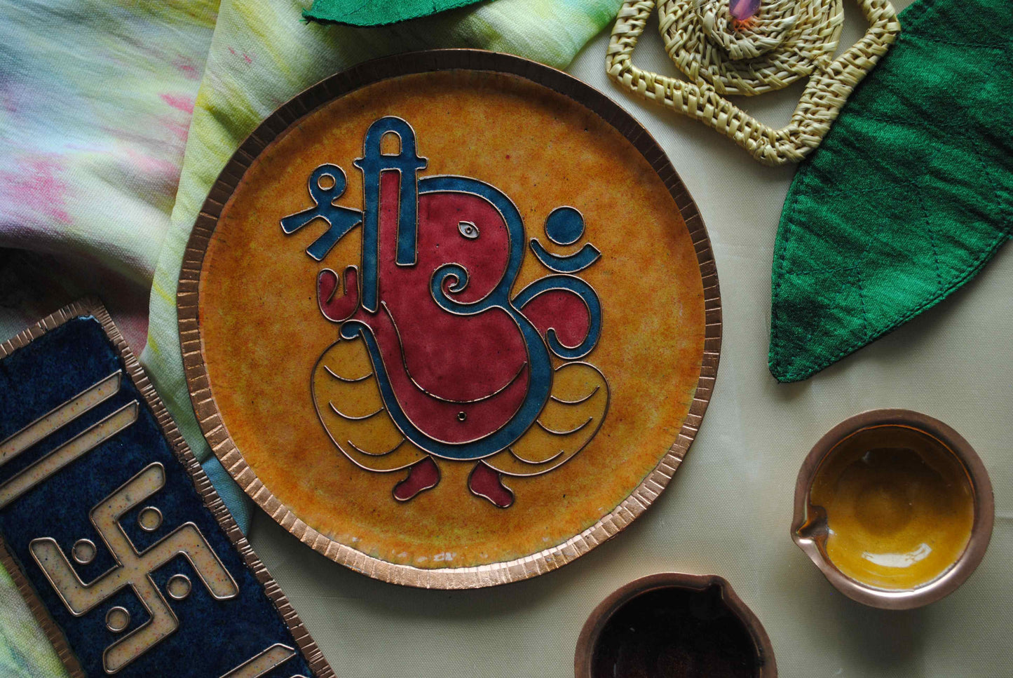 Home decor wall plates of Ganesh as Omkara, Ekdanaka, Vinayaka, handpainted and enameled on beaten copper