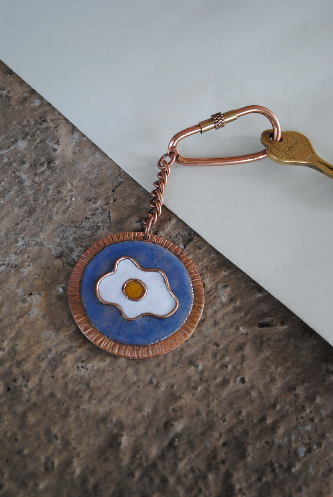 Copper enamel trinkets, keychain handcrafted in Maharashtra, India. Funky egg design