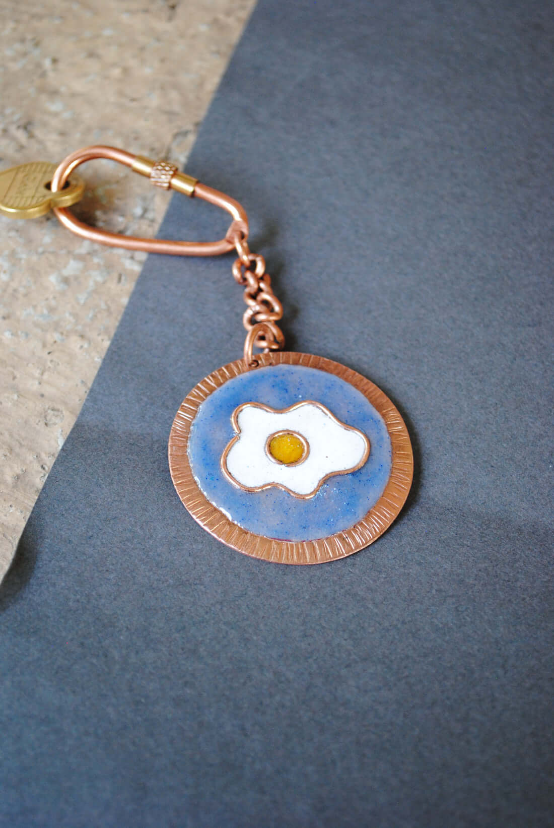 Copper enamel trinkets, keychain handcrafted in Maharashtra, India. Funky egg design