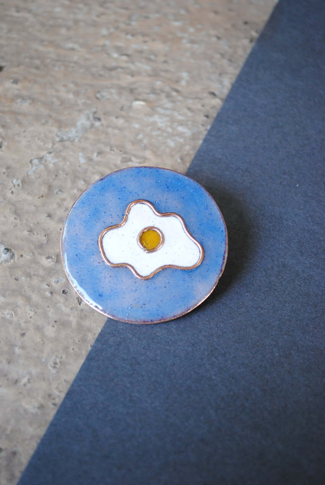 Copper enamel trinkets, lapel pin handcrafted in Maharashtra, India. Funky egg design