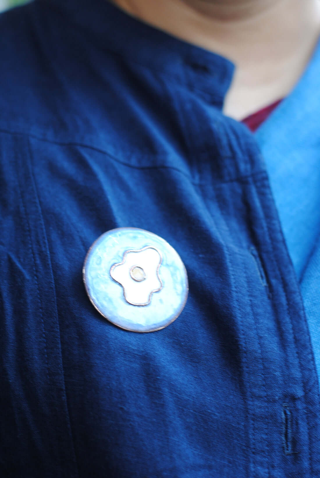 Copper enamel trinkets, lapel pin handcrafted in Maharashtra, India. Funky egg design