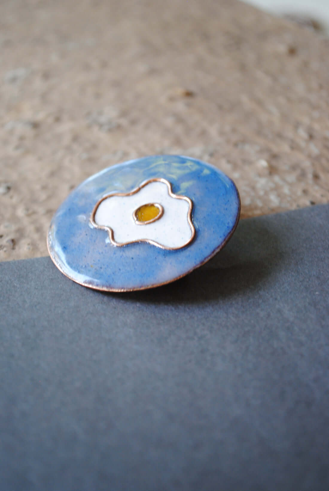 Copper enamel trinkets, lapel pin handcrafted in Maharashtra, India. Funky egg design