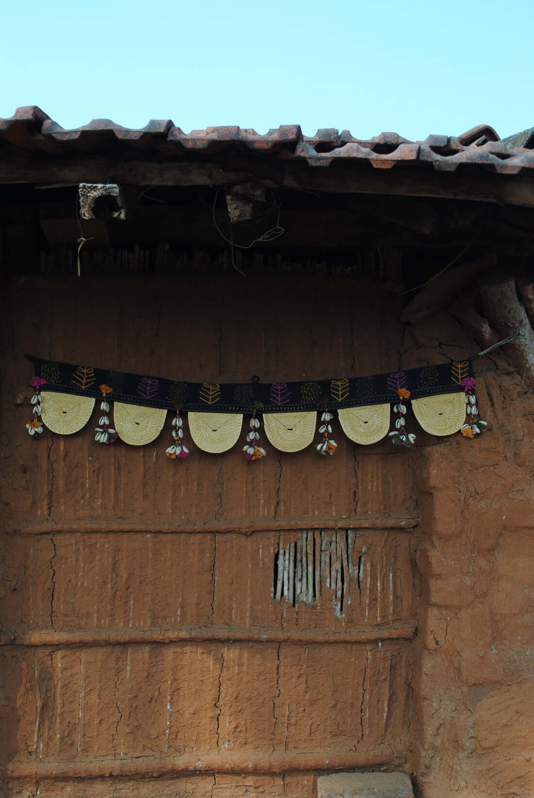 Handcrafted golden grass weavers create torans as new designs to keep the old art relevant in modern days