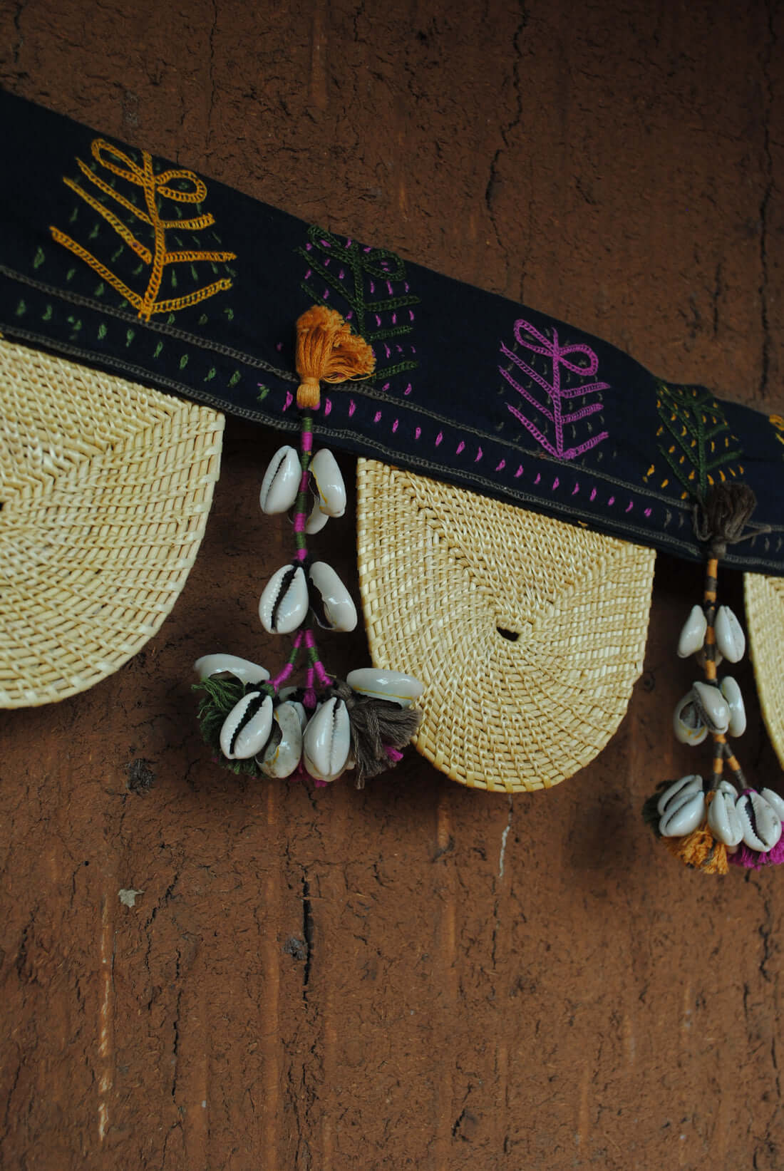Handcrafted golden grass weavers create torans as new designs to keep the old art relevant in modern days