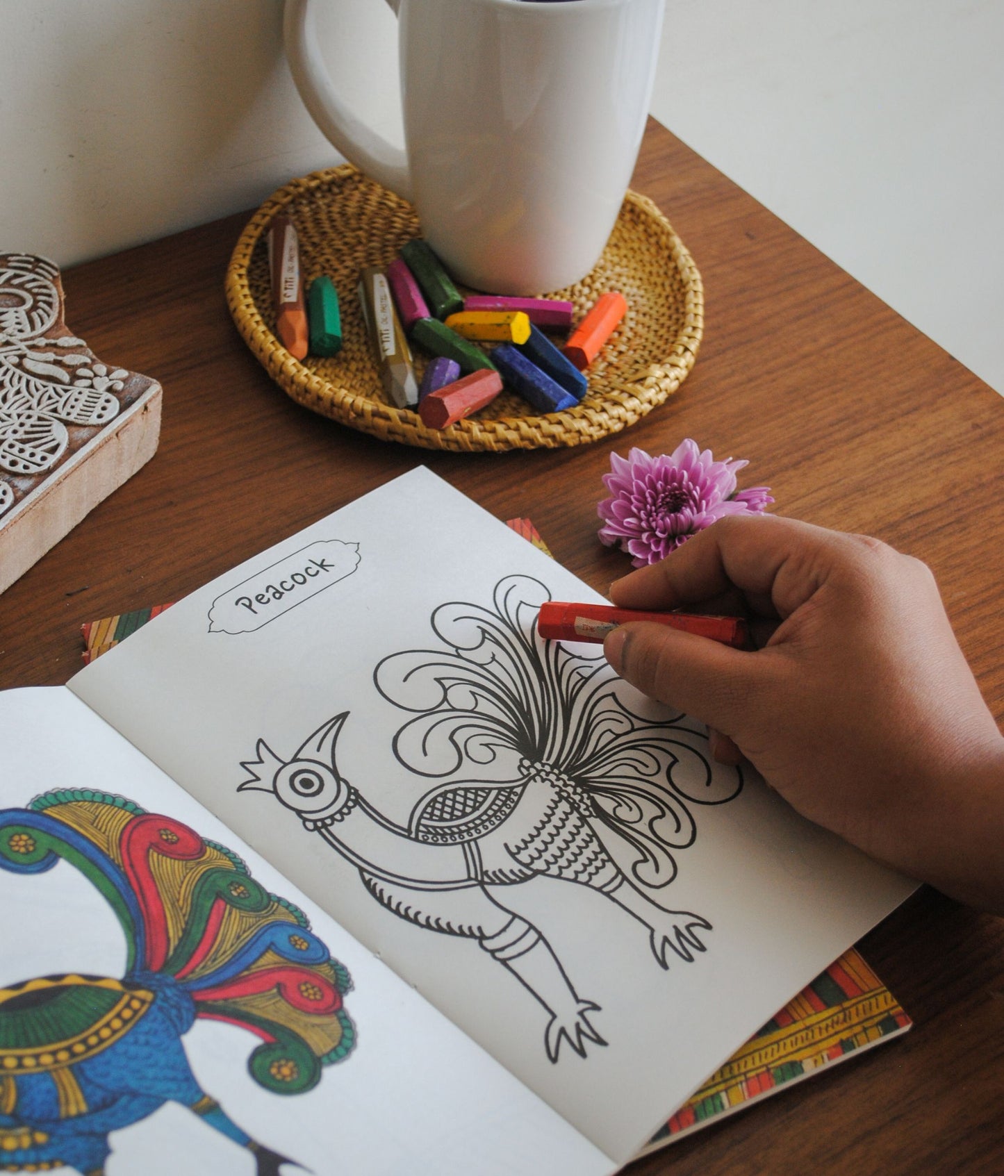 Artwork by native craftsmen of Chitrakathi, Gond, that are used as motifs to create stationery and colouring books