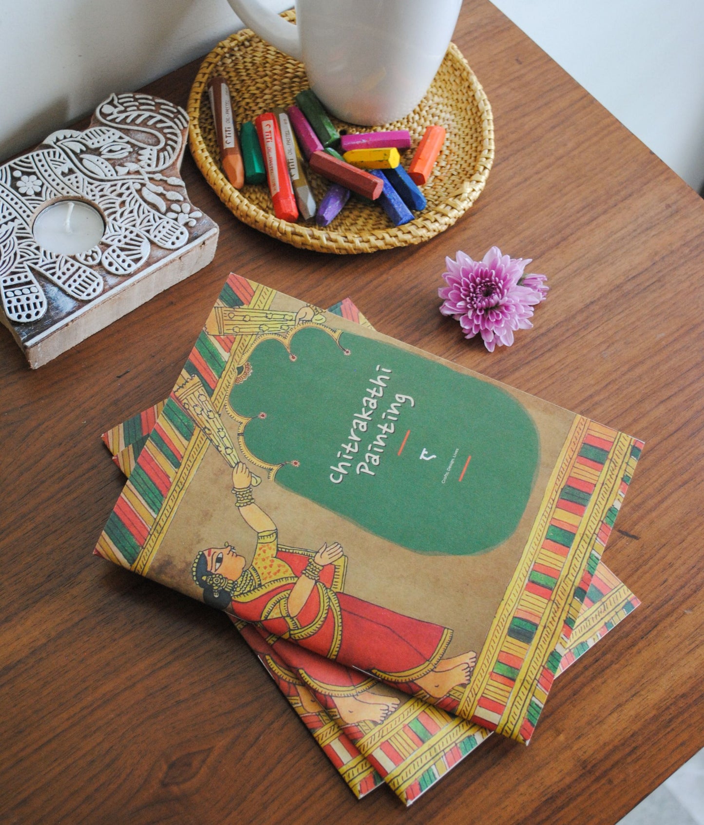 Artwork by native craftsmen of Chitrakathi, Gond, that are used as motifs to create stationery and colouring books