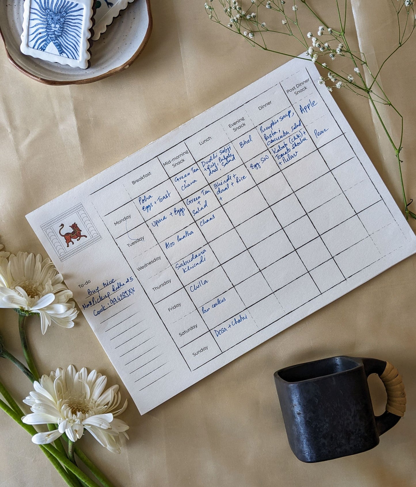 Artwork by native craftsmen of Chitrakathi, Gond, that are used as motifs to create stationery. This one is Vishnu avtaar as wild boar