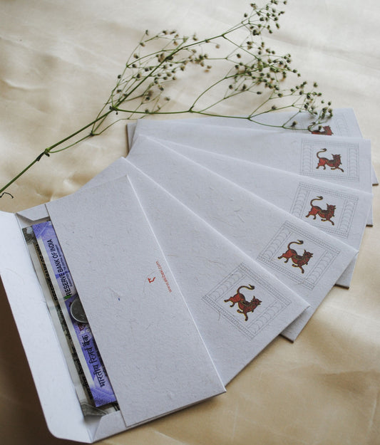 Artwork by native craftsmen of Chitrakathi, Gond, that are used as motifs to create stationery. This one is Vishnu avtaar as wild boar