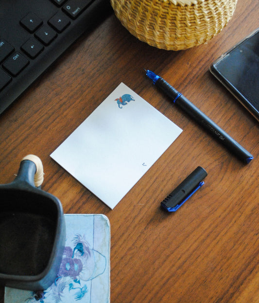 Artwork by native craftsmen of Chitrakathi, Gond, that are used as motifs to create stationery. This one is the gajoba elephant motif