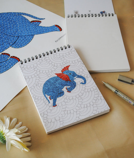 Artwork by native craftsmen of Chitrakathi, Gond, that are used as motifs to create stationery. This one is the gajoba elephant motif