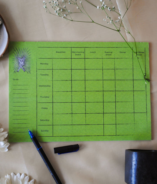 Artwork by native craftsmen of Chitrakathi, Gond, that are used as motifs to create stationery. This one is the waghoba lion motif