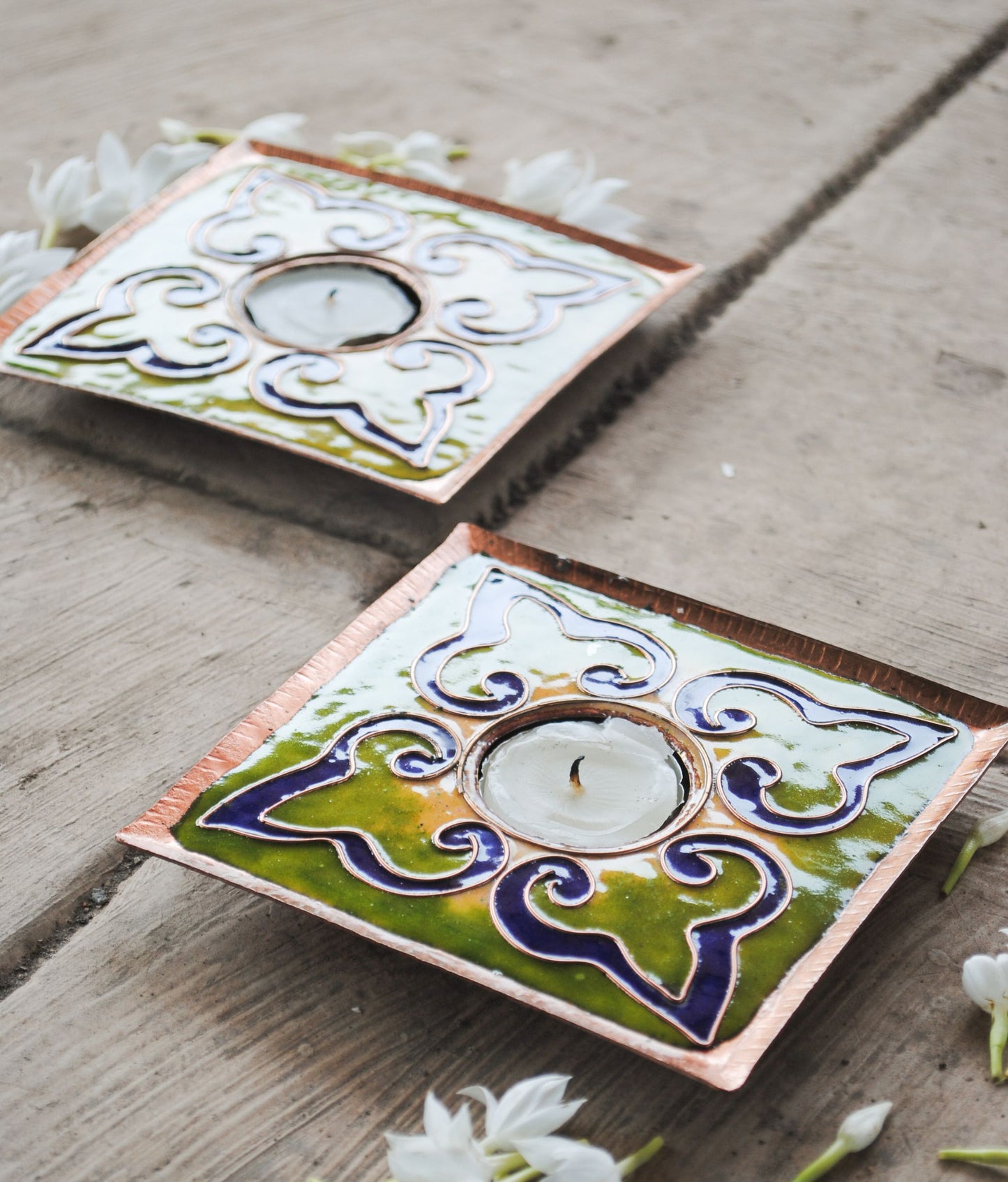 Copper enamel home decor, handcrafted in Maharashtra, India. Tea light holders
