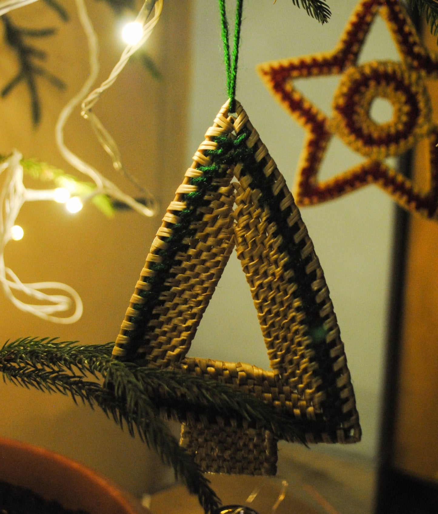 Handcrafted golden grass weavers create Christmas ornaments as new designs to keep the old art relevant in modern days