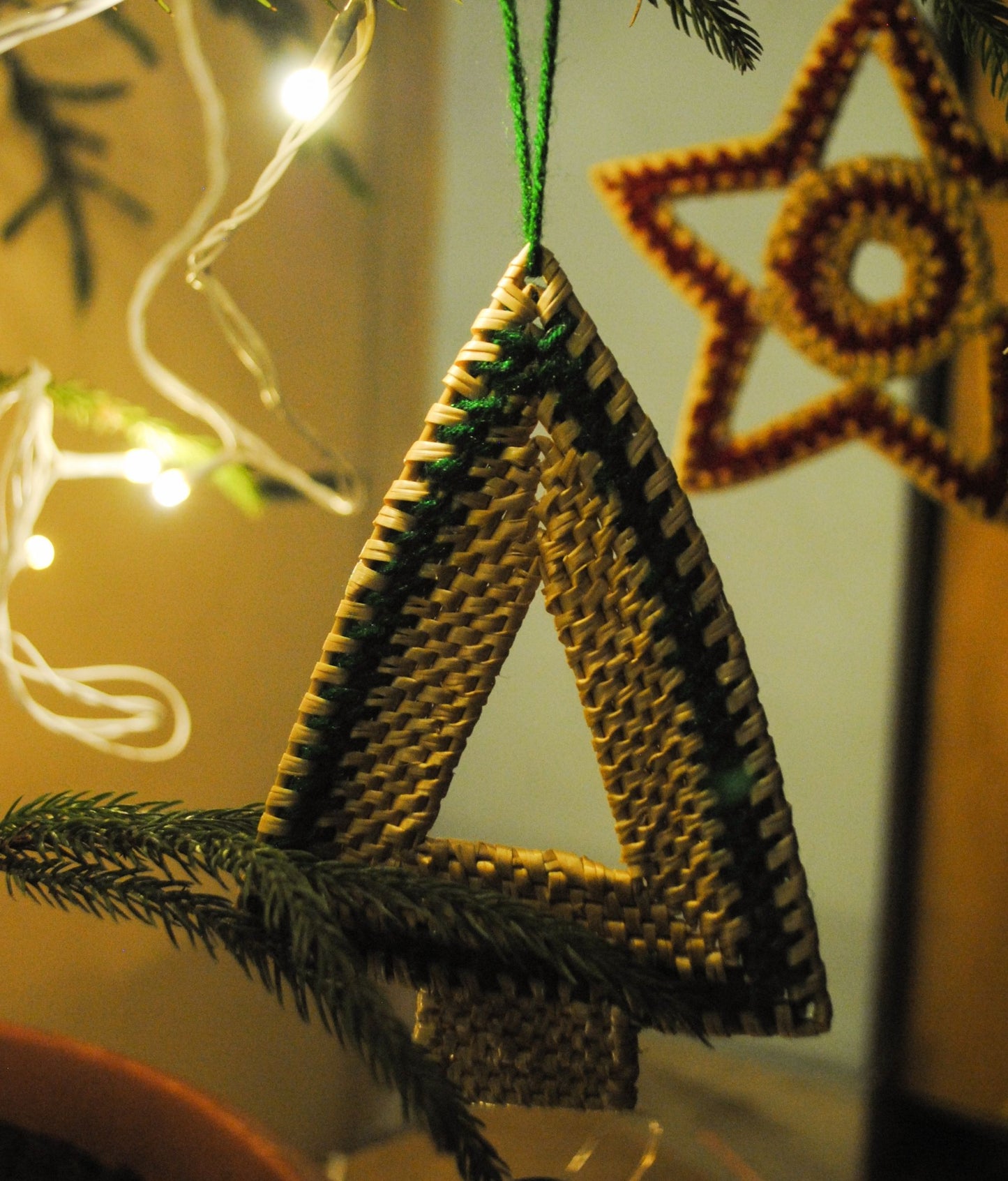Handcrafted golden grass weavers create Christmas ornaments as new designs to keep the old art relevant in modern days