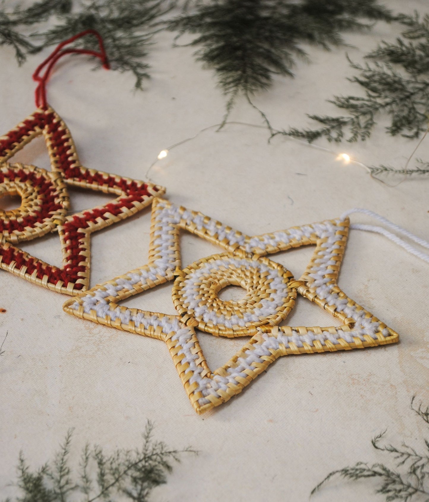 Handcrafted golden grass weavers create Christmas ornaments as new designs to keep the old art relevant in modern days