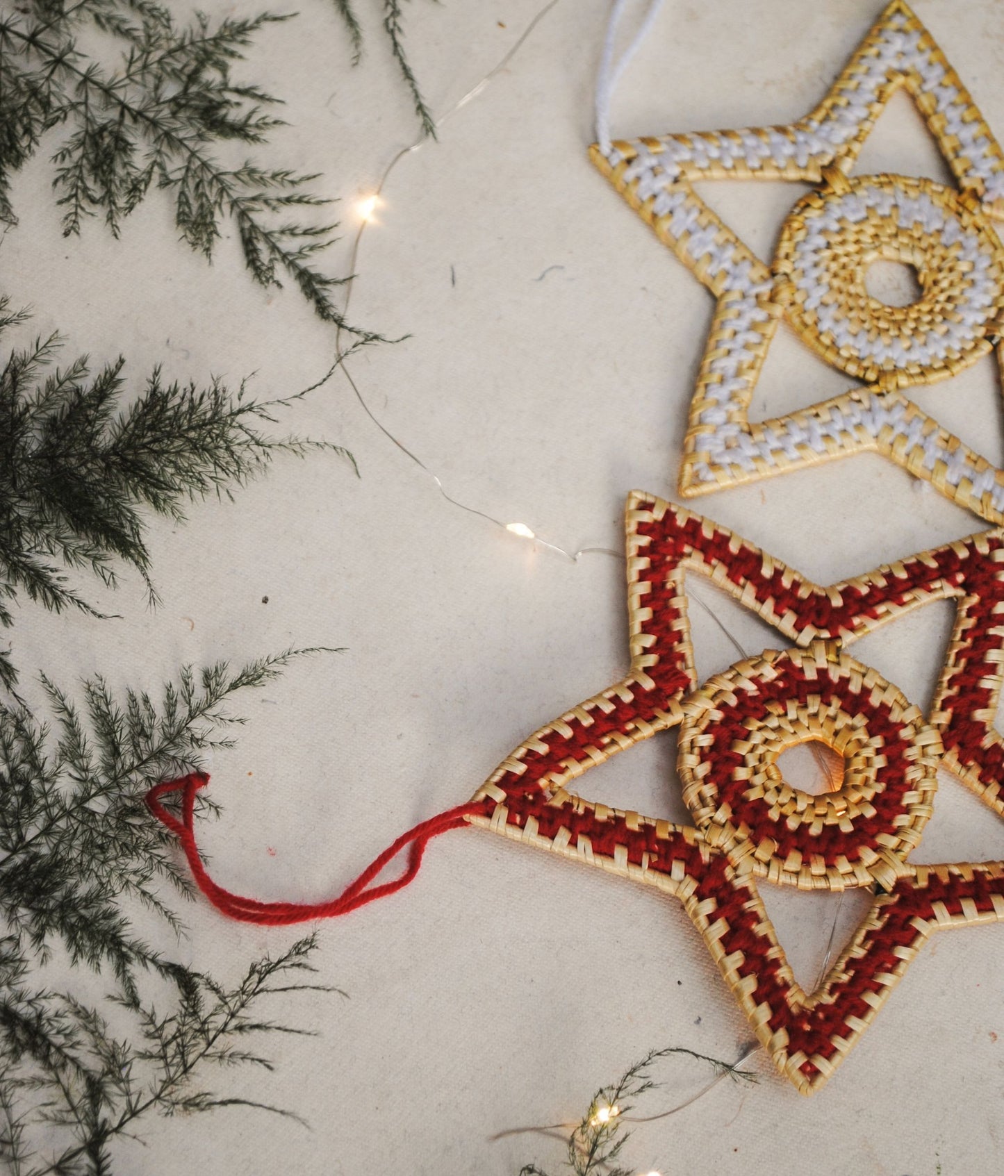 Handcrafted golden grass weavers create Christmas ornaments as new designs to keep the old art relevant in modern days