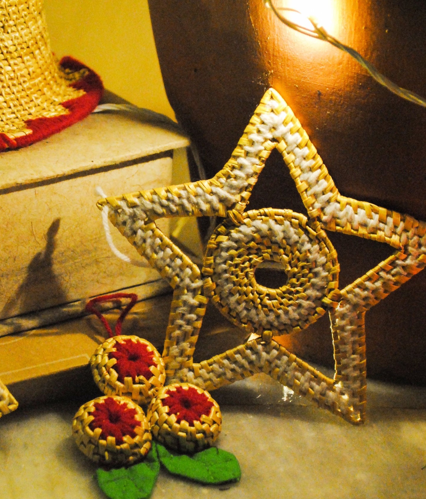 Handcrafted golden grass weavers create Christmas ornaments as new designs to keep the old art relevant in modern days