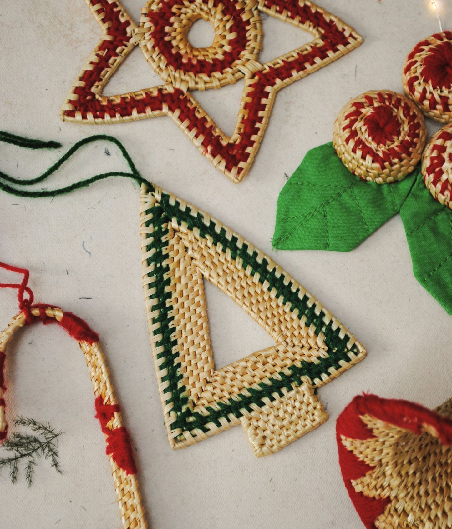 Handcrafted golden grass weavers create Christmas ornaments as new designs to keep the old art relevant in modern days