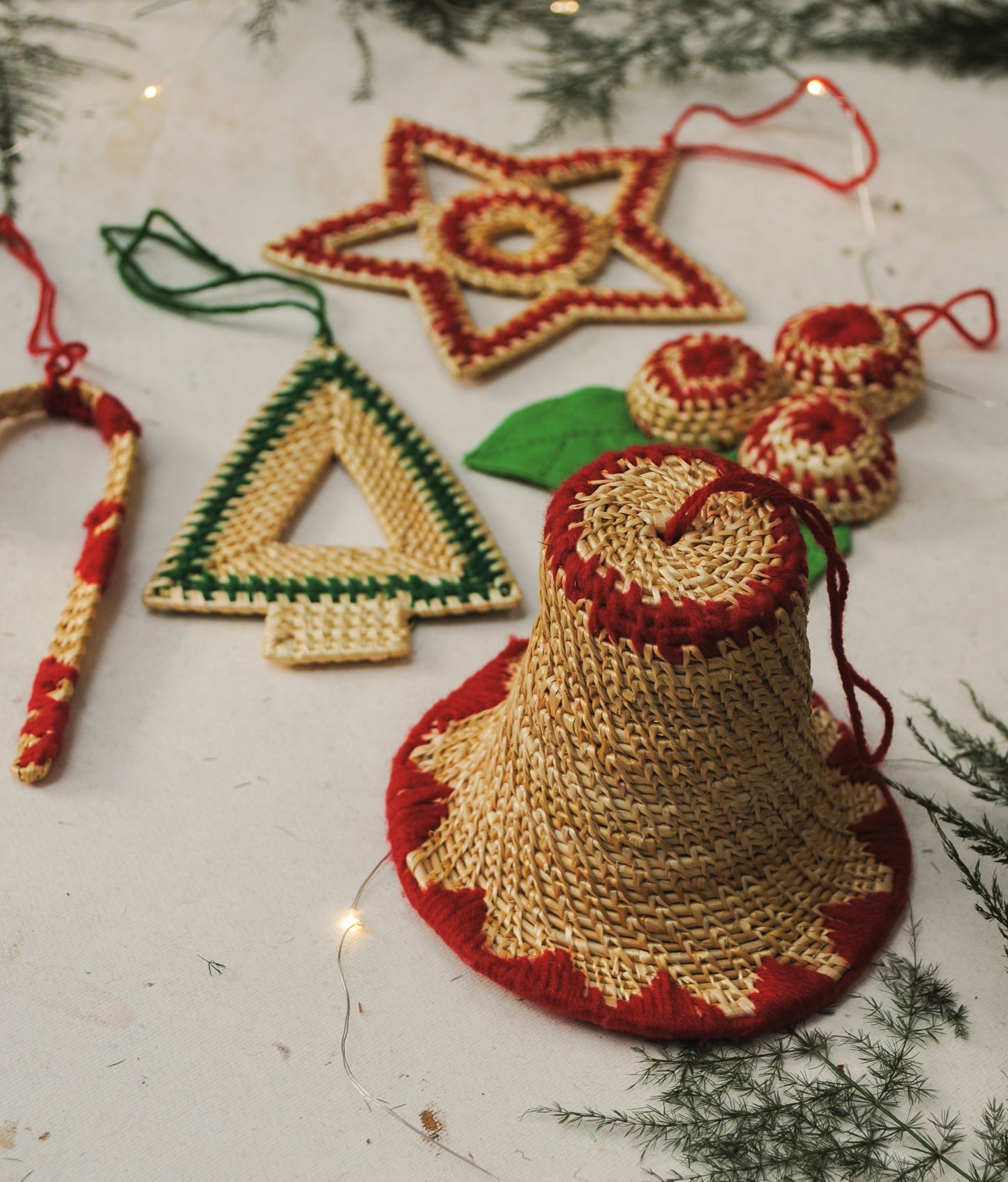Handcrafted golden grass weavers create Christmas ornaments as new designs to keep the old art relevant in modern days