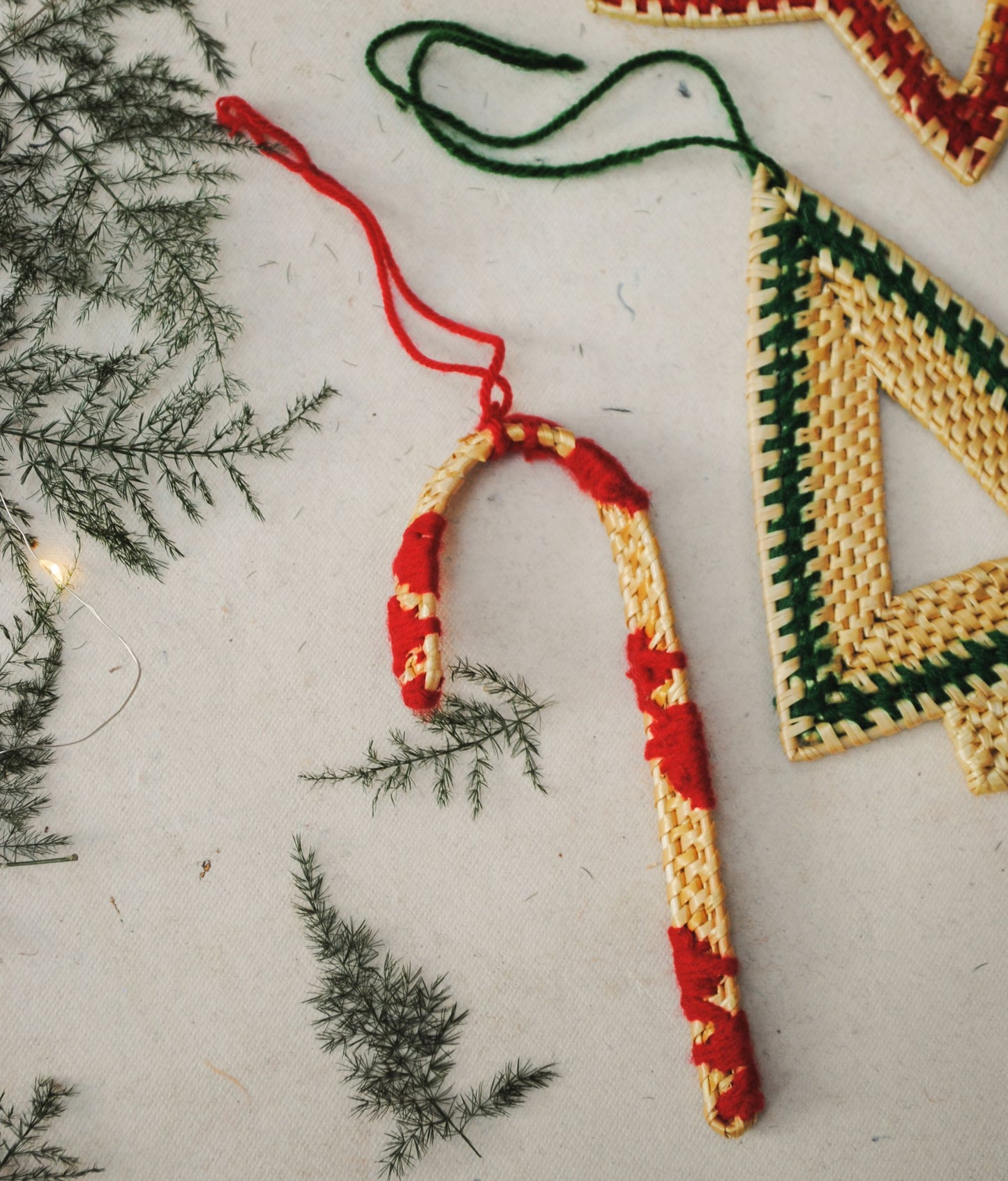 Handcrafted golden grass weavers create Christmas ornaments as new designs to keep the old art relevant in modern days
