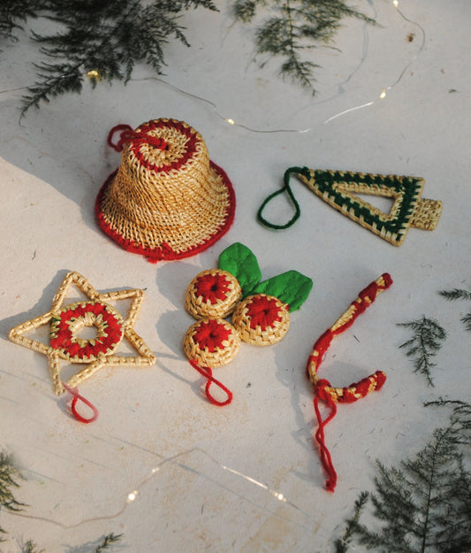 Handcrafted golden grass weavers create Christmas ornaments as new designs to keep the old art relevant in modern days