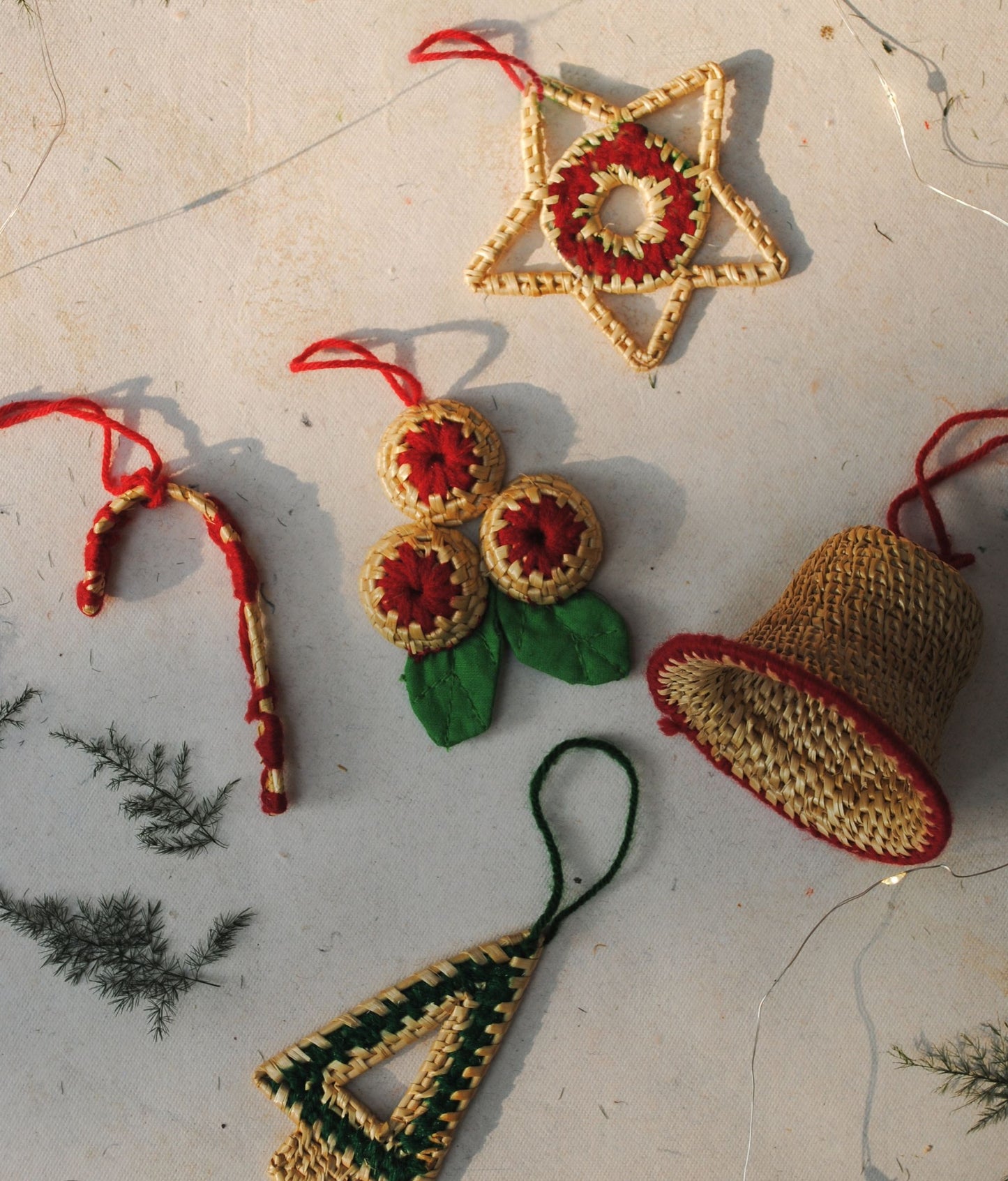 Handcrafted golden grass weavers create Christmas ornaments as new designs to keep the old art relevant in modern days