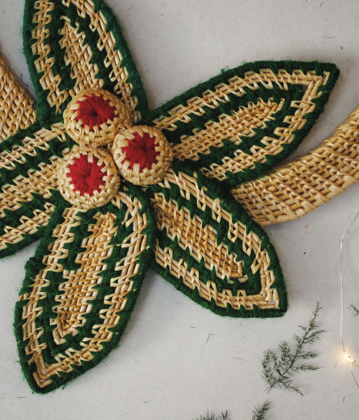 Handcrafted golden grass weavers create Christmas ornaments as new designs to keep the old art relevant in modern days