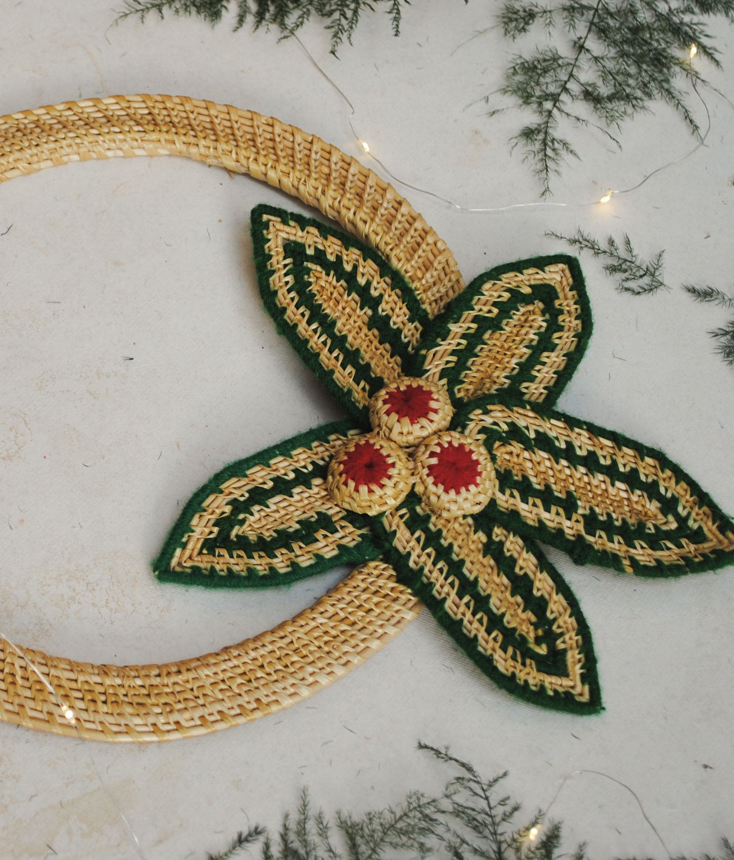 Handcrafted golden grass weavers create Christmas ornaments as new designs to keep the old art relevant in modern days