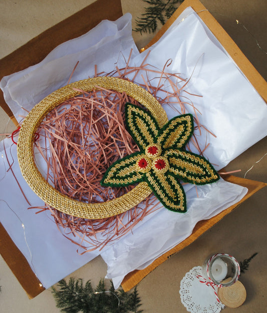 Handcrafted golden grass weavers create Christmas ornaments as new designs to keep the old art relevant in modern days
