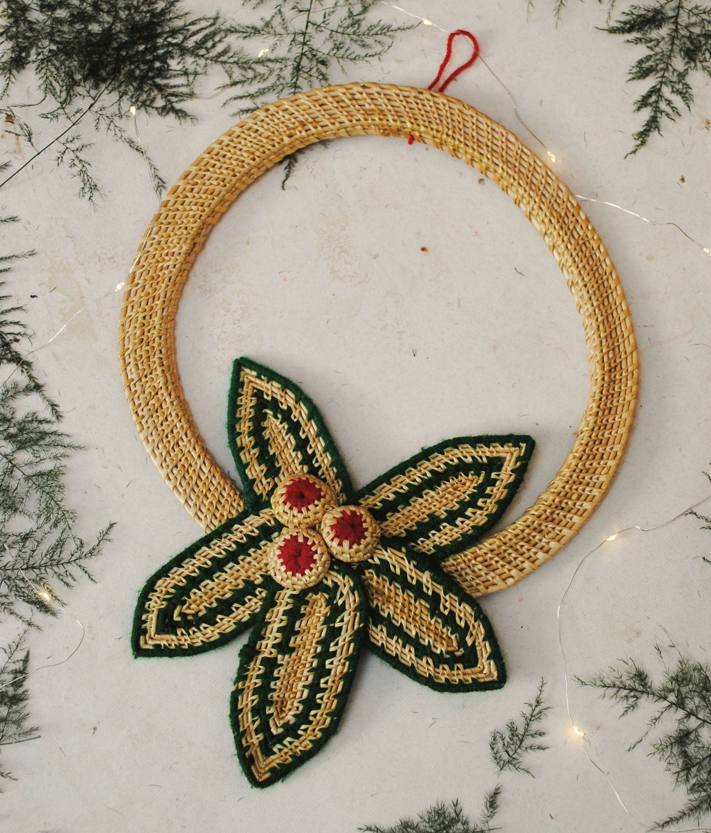 Handcrafted golden grass weavers create Christmas ornaments as new designs to keep the old art relevant in modern days