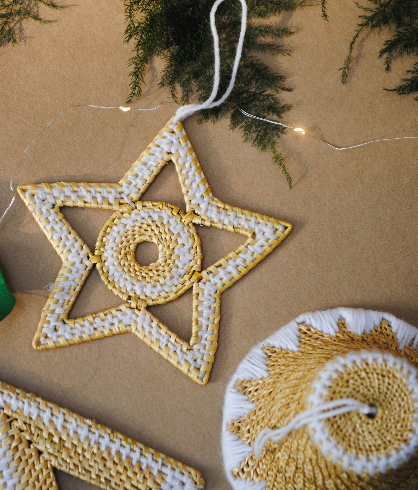 Handcrafted golden grass weavers create Christmas ornaments as new designs to keep the old art relevant in modern days
