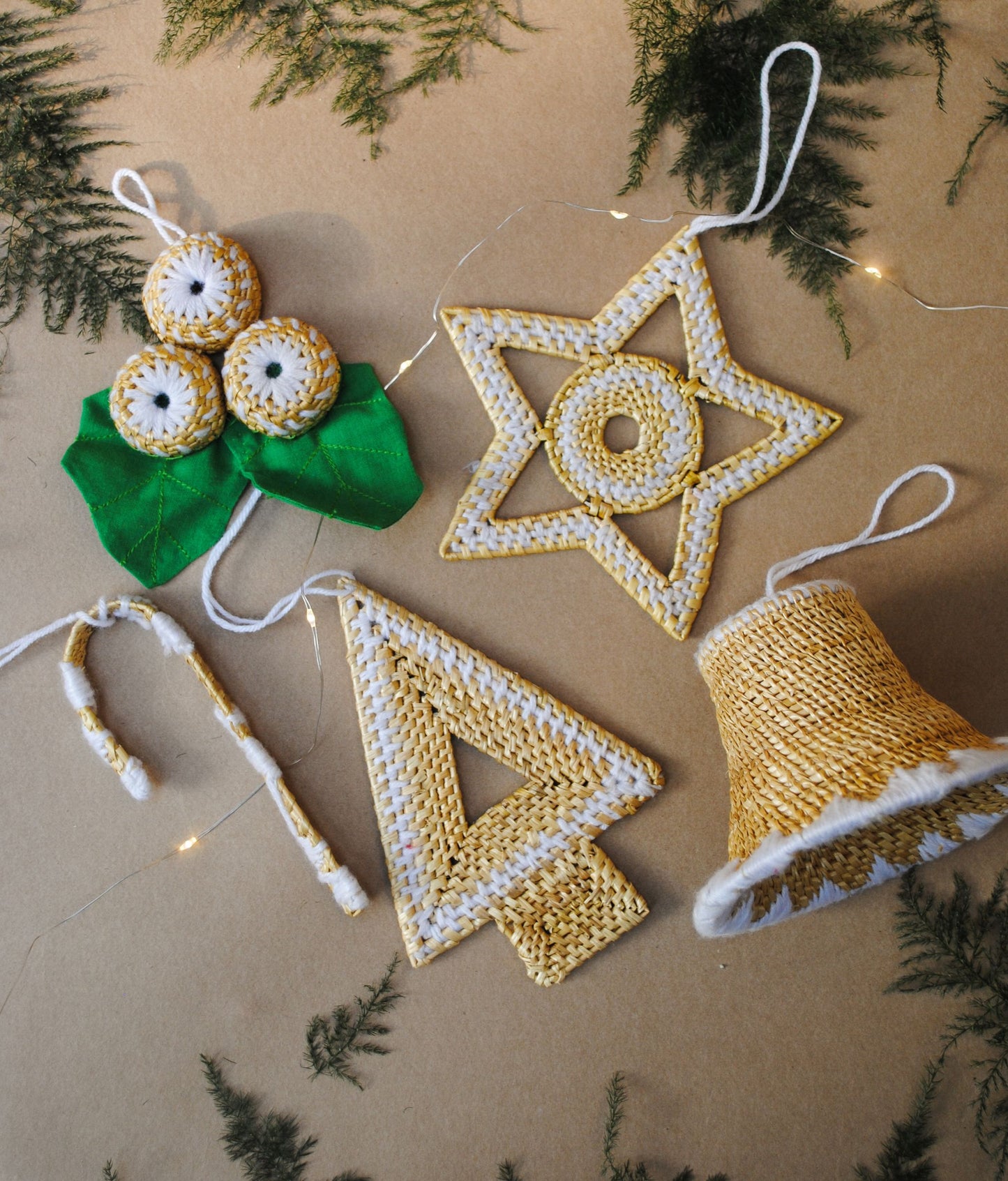 Handcrafted golden grass weavers create Christmas ornaments as new designs to keep the old art relevant in modern days
