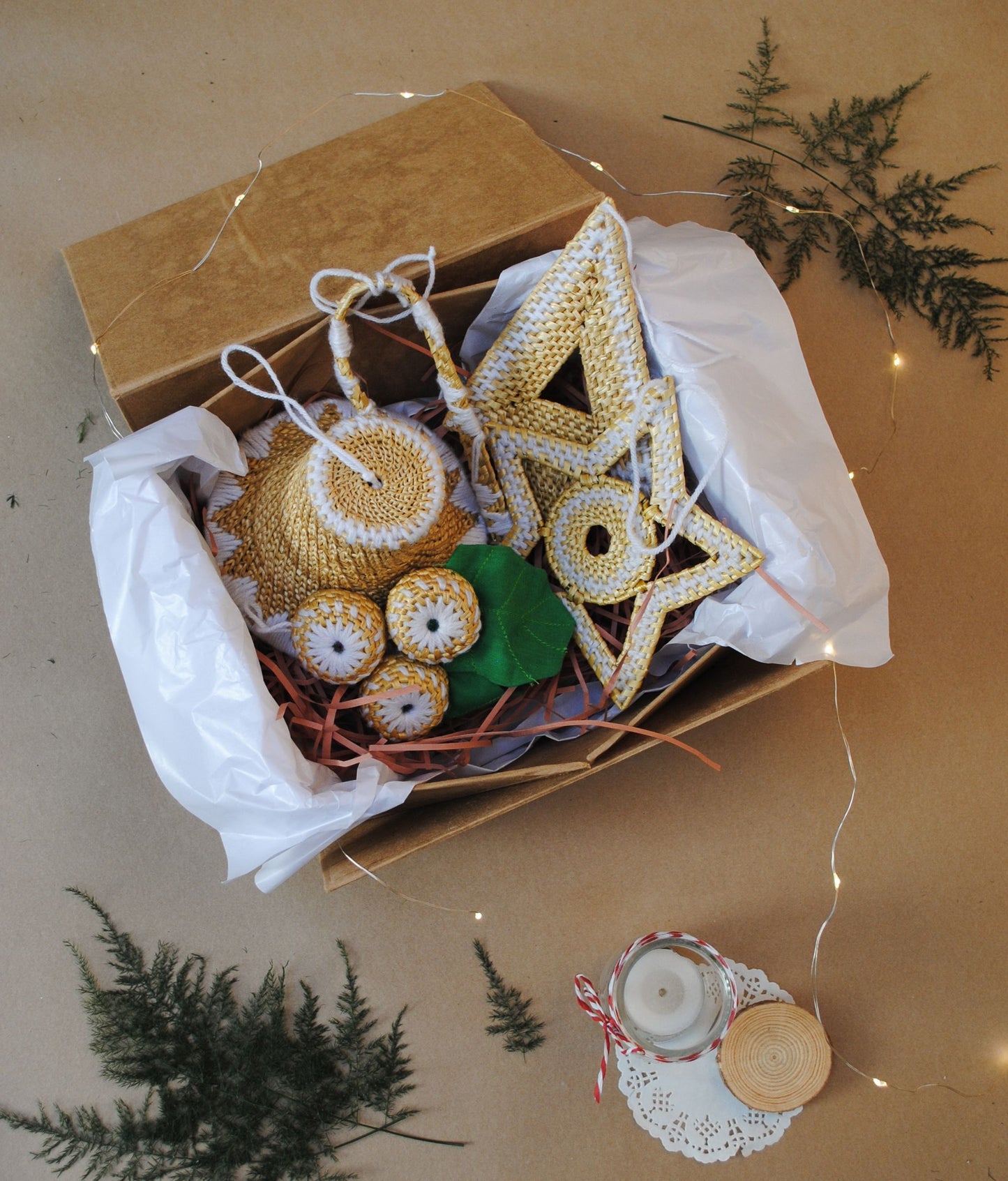 Handcrafted golden grass weavers create Christmas ornaments as new designs to keep the old art relevant in modern days