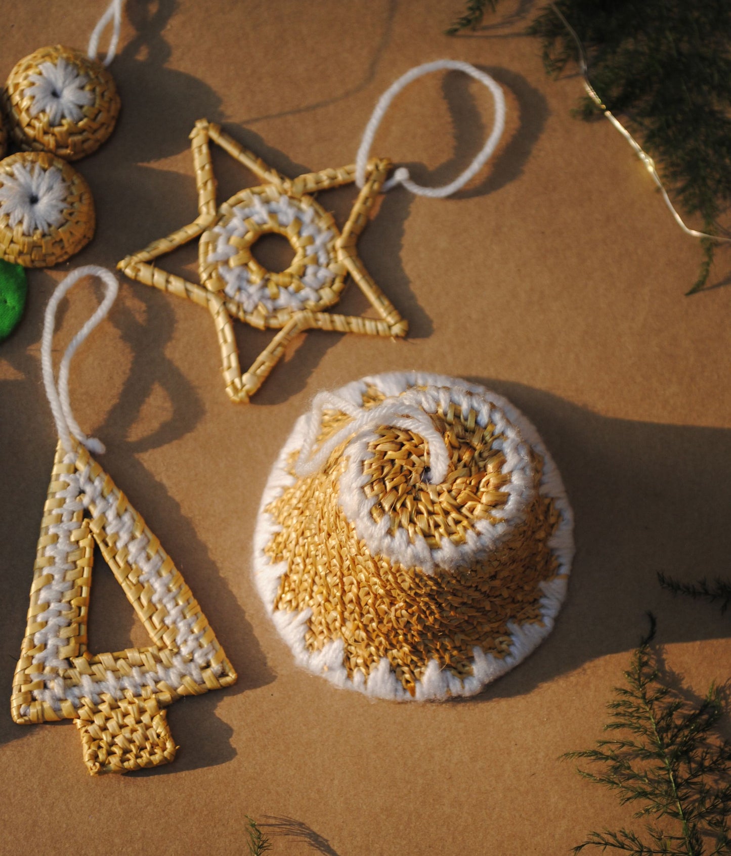 Handcrafted golden grass weavers create Christmas ornaments as new designs to keep the old art relevant in modern days
