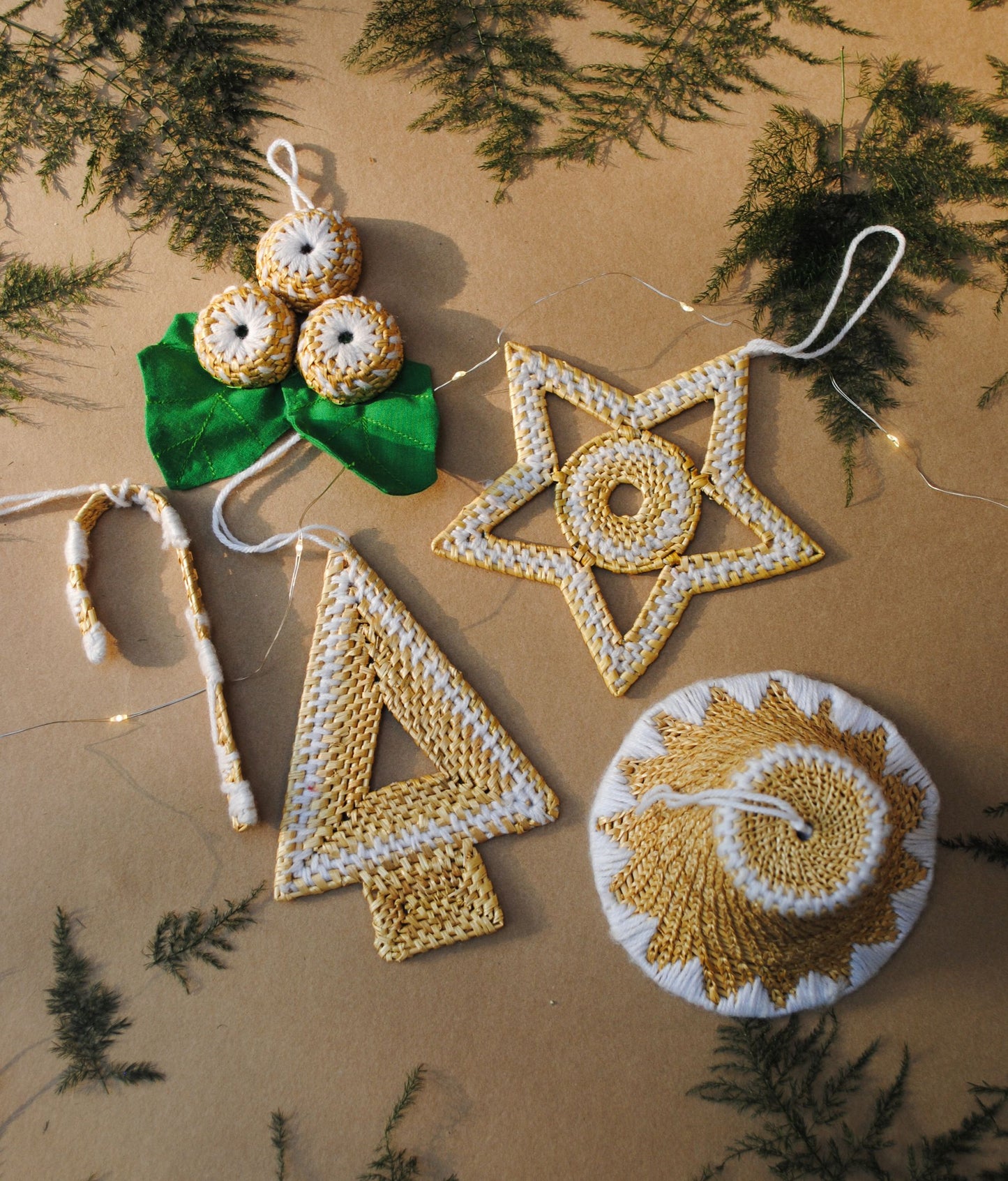 Handcrafted golden grass weavers create Christmas ornaments as new designs to keep the old art relevant in modern days