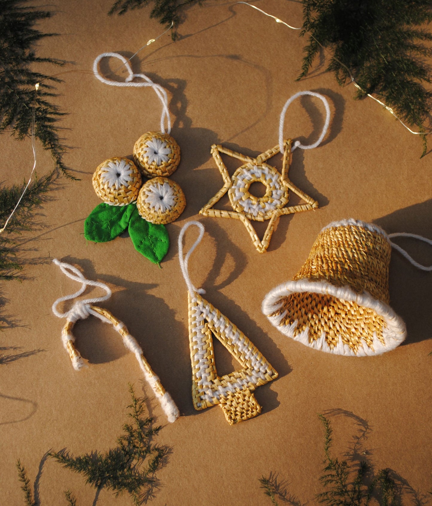 Handcrafted golden grass weavers create Christmas ornaments as new designs to keep the old art relevant in modern days