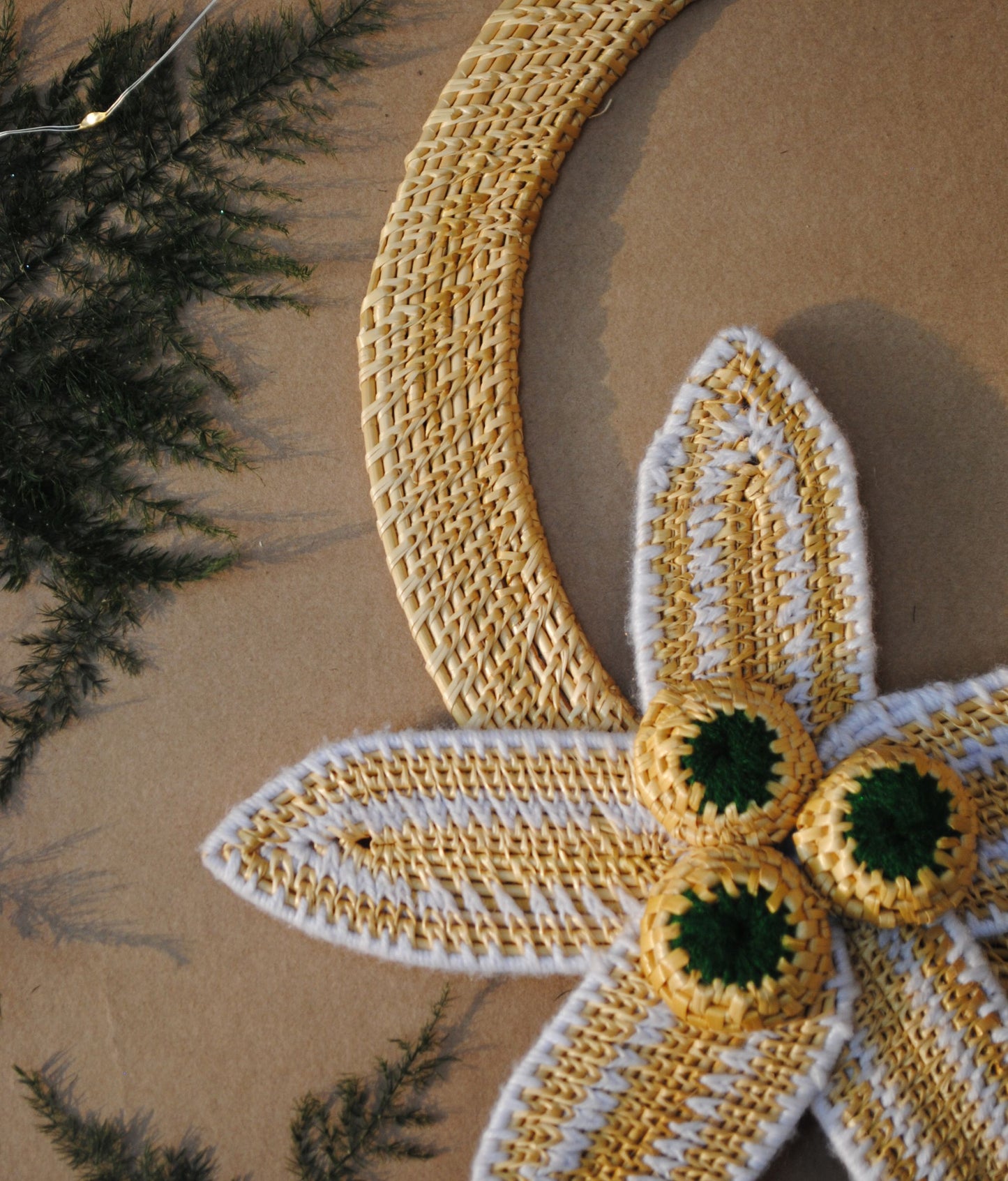 Handcrafted golden grass weavers create Christmas ornaments as new designs to keep the old art relevant in modern days