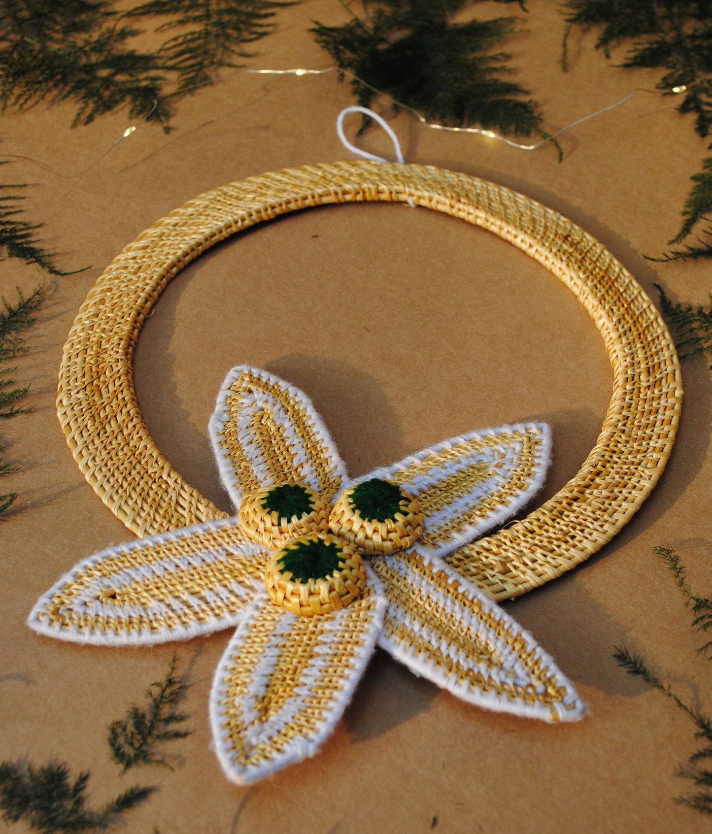 Handcrafted golden grass weavers create Christmas ornaments as new designs to keep the old art relevant in modern days
