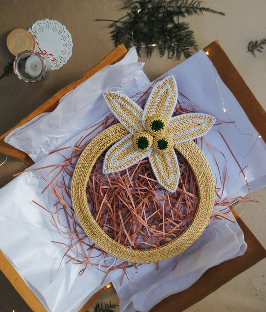 Handcrafted golden grass weavers create Christmas ornaments as new designs to keep the old art relevant in modern days