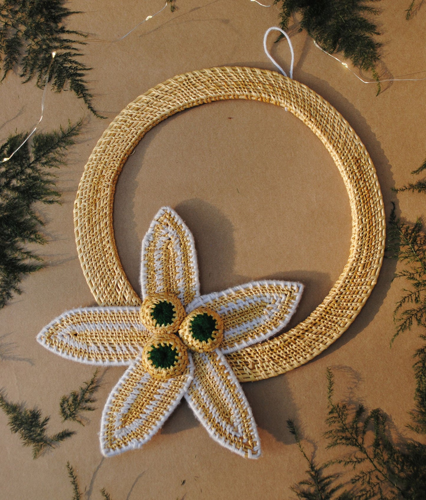 Handcrafted golden grass weavers create Christmas ornaments as new designs to keep the old art relevant in modern days