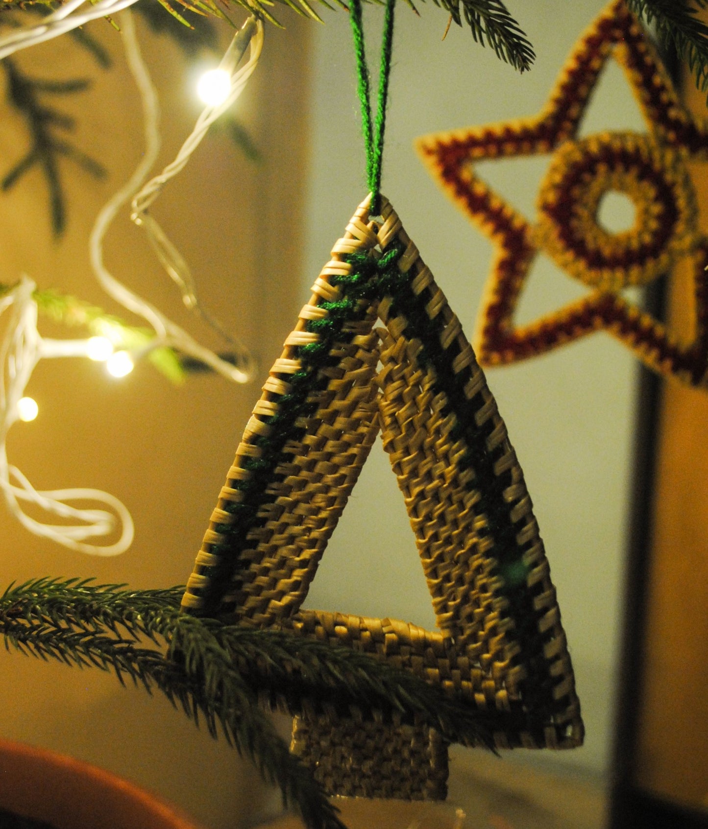 Handcrafted golden grass weavers create decorative items for Christmas, as new designs to keep the old art relevant in modern days