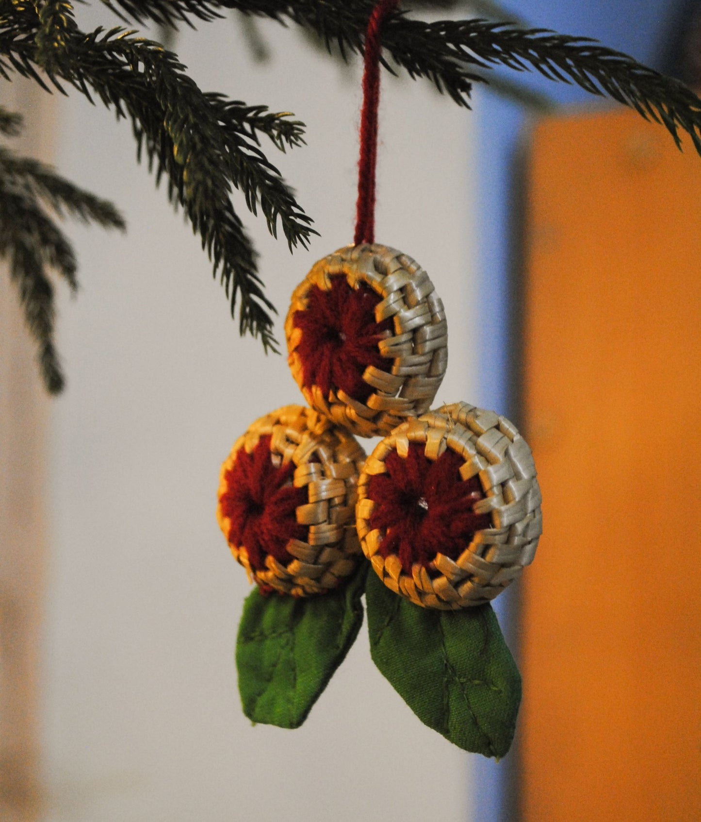 Handcrafted golden grass weavers create Christmas ornaments as new designs to keep the old art relevant in modern days