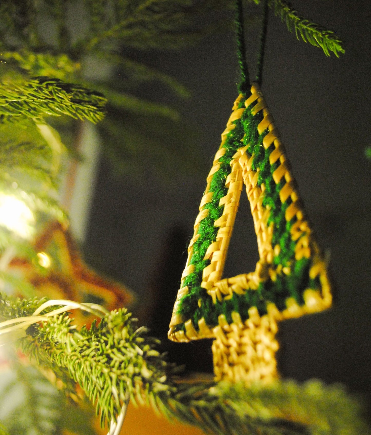 Handcrafted golden grass weavers create decorative items for Christmas, as new designs to keep the old art relevant in modern days